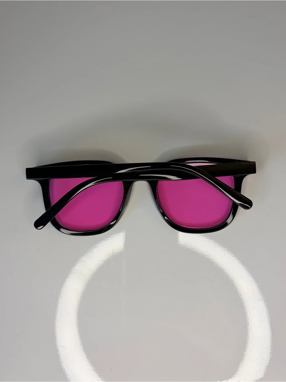 Women’s Like New Black Frame Plastic Sunglasses with Pink Lenses